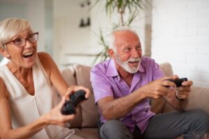 Seniors Playing Video Game